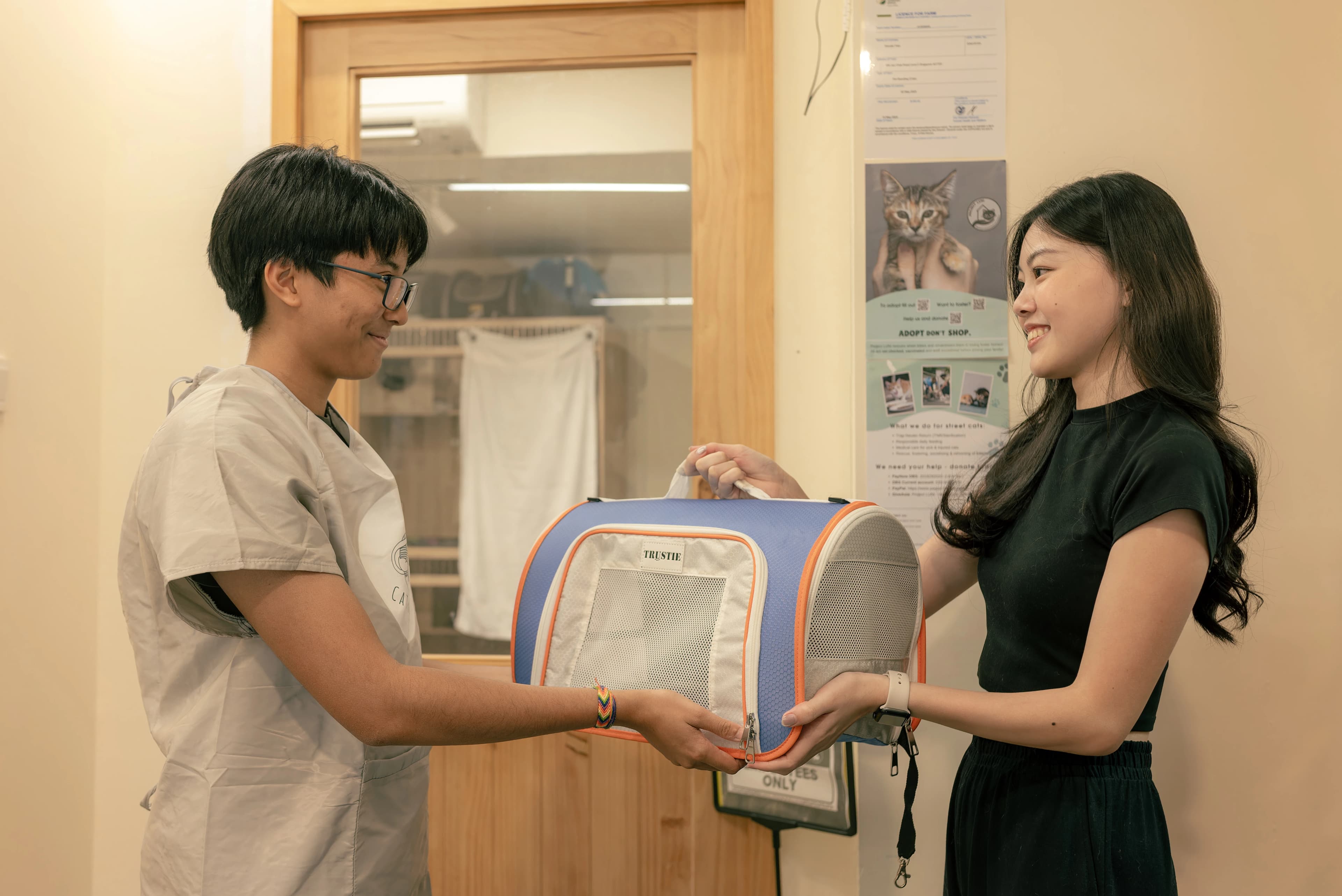 Exchange of cat between staff and customer